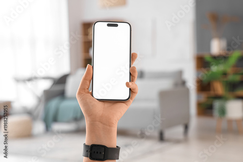 Woman with blank mobile pho...