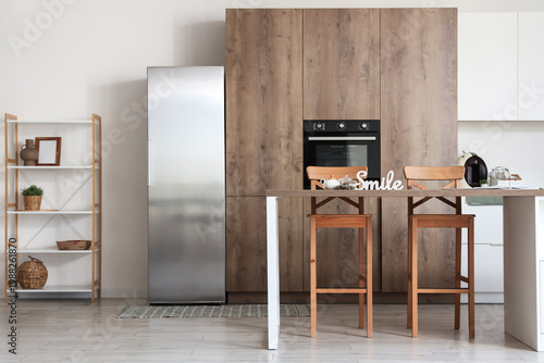 Big modern fridge in interi...