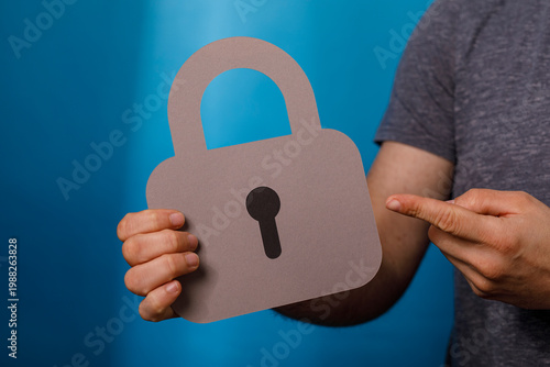 A person holding and pointi...