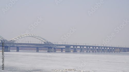 Harbin's Songhua River frozen by the cold