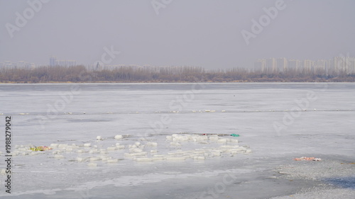 Harbin's Songhua River frozen by the cold