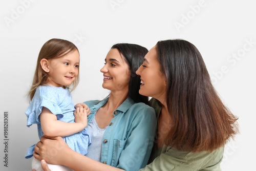 Young lesbian couple with a...