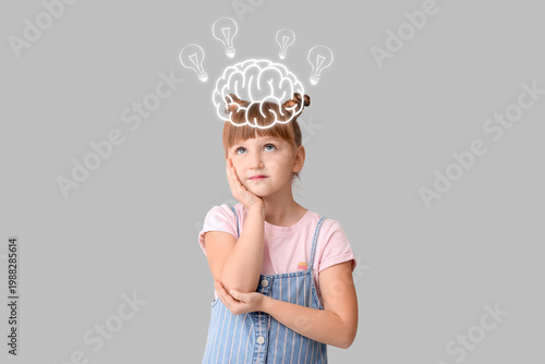 Thoughtful little girl on l...