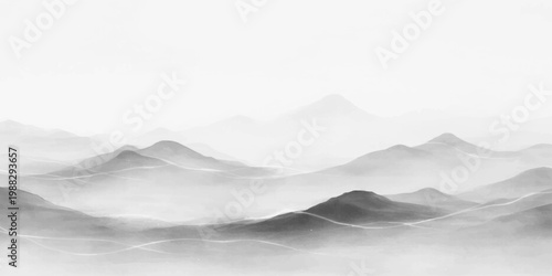 A misty mountain landscape at dawn features snow-capped peaks rising above a fog-filled valley under a soft sunset sky with drifting clouds