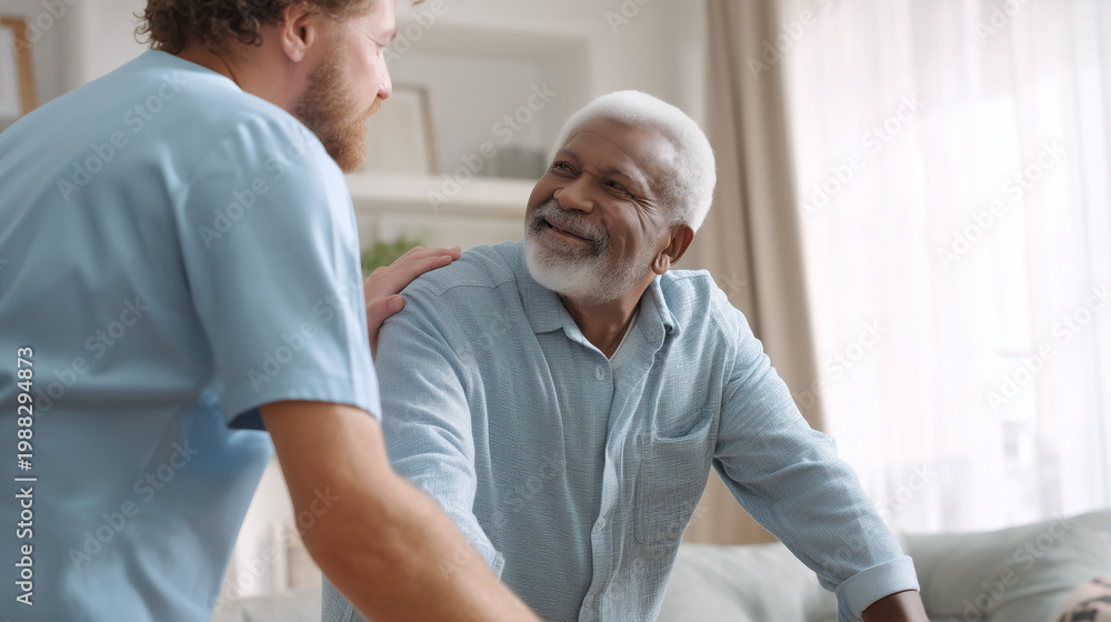 Obraz premium Healthcare worker supporting senior man at home, elderly care and assistance concept, friendly communication.