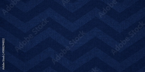 A seamless dark blue fabric texture with an abstract vintage grunge pattern creates a stylish textile backdrop for artistic wallpaper and material design