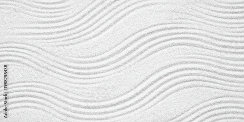 Abstract white sand texture background features a wavy nature pattern of dry desert dunes with a grainy material surface