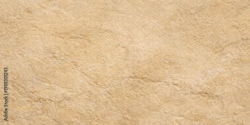 A high-quality vintage brown parchment texture featuring a blank aged paper surface with a rough antique grunge pattern and a yellowed ancient material design for a textured cardboard background