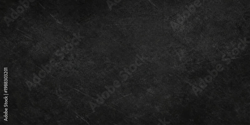 A dark black leather texture with a rough grunge pattern on a vintage paper surface creates a blank textured material background for a grey canvas wallpaper design