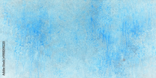 A distressed turquoise watercolor texture with an aged blue paint pattern on a rough vintage paper canvas backdrop provides an abstract grunge surface design for this old wall wallpaper material