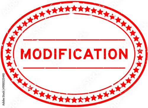 Grunge red modification word oval rubber seal stamp on white background