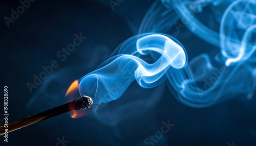burning match on black background