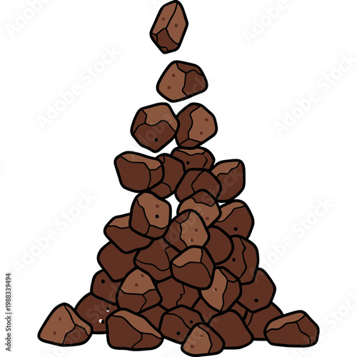Rocks are stacked high in a precarious pile outdoors naturally