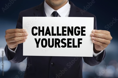 Motivational Coach Holding a Sign to Challenge Yourself
