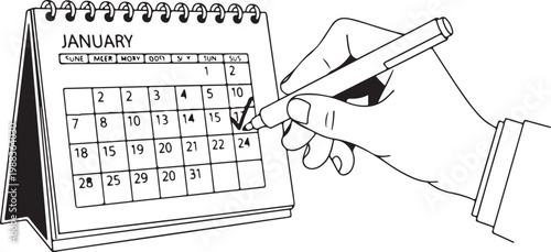 Hand marking date on january calendar page with pen