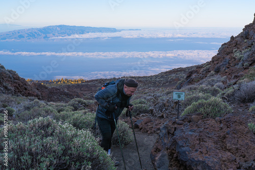 Konstfotografi A tired tourist on the nature trail in Teide National Park