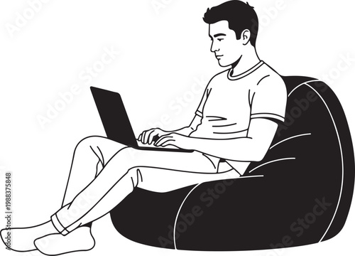 Man sitting on bean bag chair using laptop relaxed
