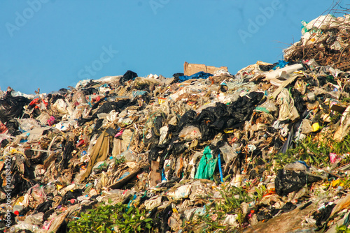 фотографія Pollution concept. Garbage pile in trash dump or landfill.