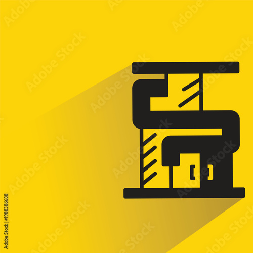 modern building icon with shadow on yellow background