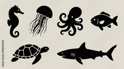 Black silhouettes of various sea creatures.