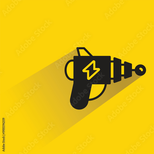 ray gun icon with shadow on yellow background