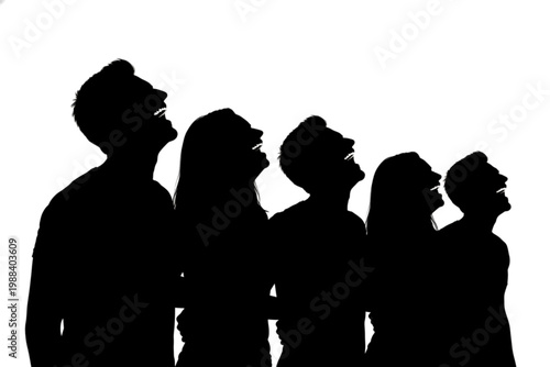 Silhouettes of Laughter: Capturing a moment of pure mirth, a group of individuals share genuine laughter, their silhouettes against the light, highlighting the infectious joy of shared amusement.