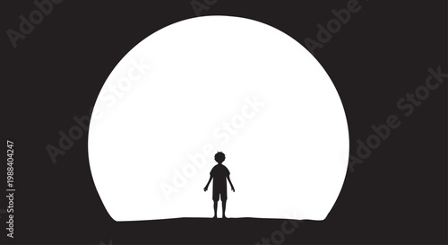 Silhouette of a child standing before a giant moon