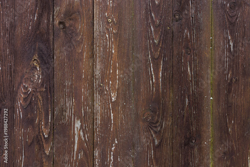 Tableau sur toile Weathered brown wooden planks with visible grain, knots and peeling paint create
