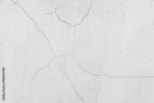 Photos Worn white plaster wall with fine hairline cracks and subtle concrete grain, per