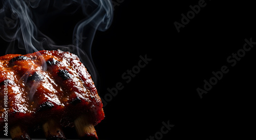Grilled BBQ Pork Ribs with Steam Smoke on Black Background