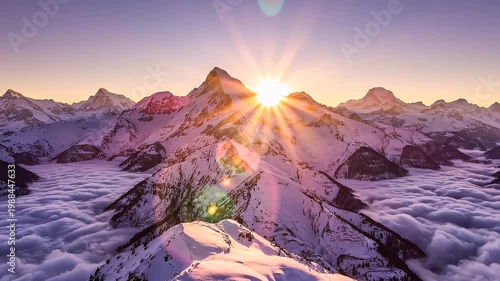 Majestic mountain landscape at sunrise over clouds and peaks  