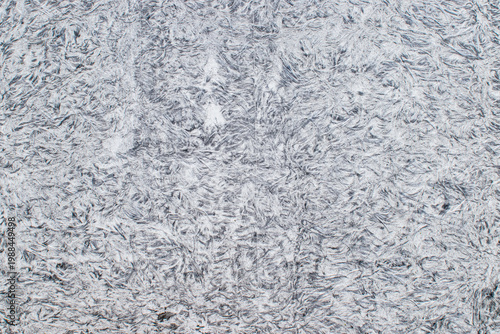 Closeup grey metallic surface with natural zinc crystal spangle abstract background.