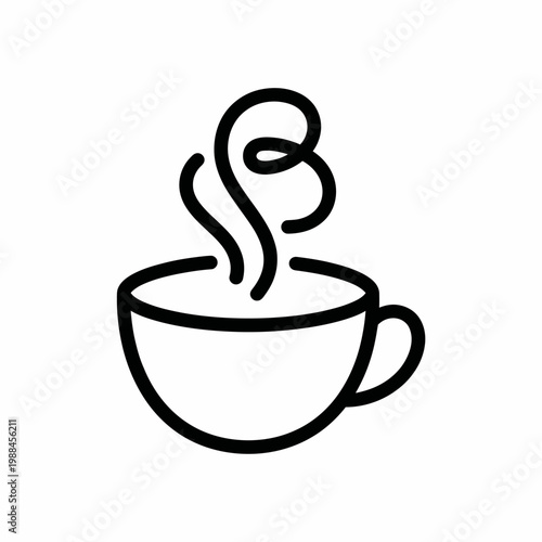 A steaming hot cup of coffee on a table indoors