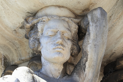 Tableau sur toile Fountain of the Caryatids Sculpted Detail at the Piazza dei Quiriti in Rome, Ita