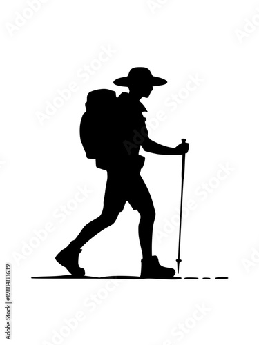 Silhouette of a hiker walking with a backpack and trekking pole