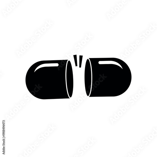 Black capsule broken in half isolated on white background.