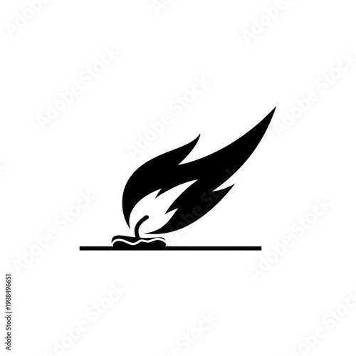 Flame burning on a surface.