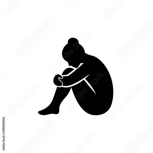 Sad woman sitting alone depressed.