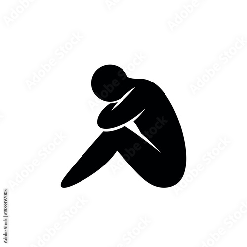 Silhouette of a person curled up in a ball symbolizing sadness and isolation.