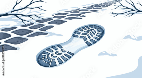 A single shoe print in the snow on a cobbled path