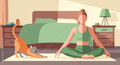 A woman in yoga clothes sits on a mat meditating while a cat stretches nearby