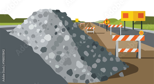 A pile of gravel sits beside a road under construction with orange barricades
