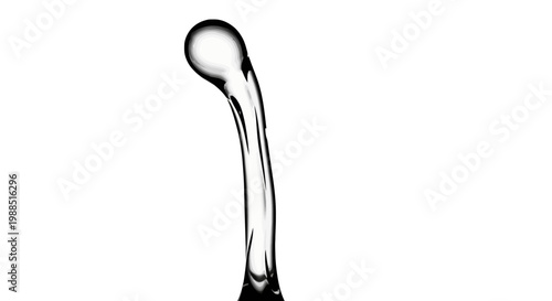 A close-up view of a single drop of liquid suspended in mid-air