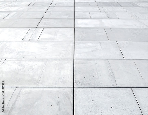 Closeup of gray concrete floor tiles.