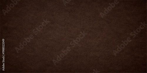 Dark brown vintage leather material with a rough grunge texture and macro grain pattern for a weathered wallpaper background