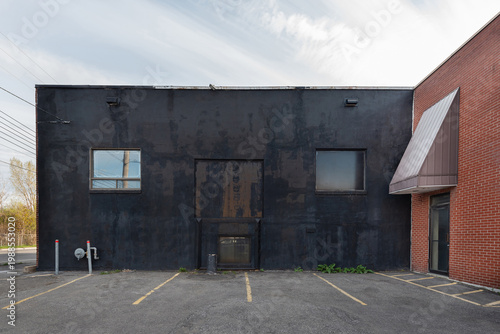 A part of the exterior facade of a generic small building