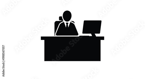 Professional business executive sitting at his desk working on a computer screen in the modern office