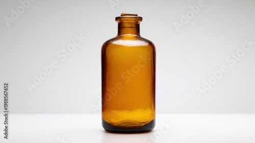 Amber glass bottle isolated on white background for product display