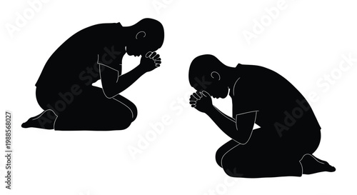 Two men bowing their heads in deep prayer while kneeling on the ground in total silence