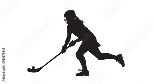 Silhouette of a female field hockey player in action with stick